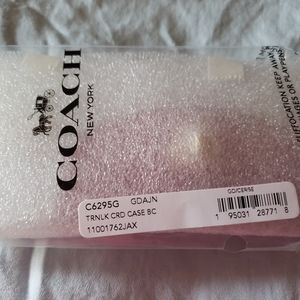 Brand new coach turnlock credit card case.